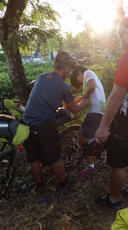 Lei packing her bike shoes.