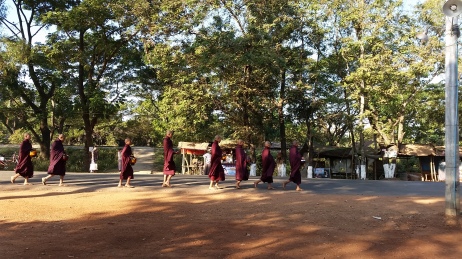 Young novice monks on their morning alms
